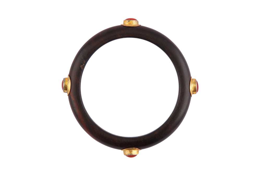 Lot 53 - A WOOD BANGLE