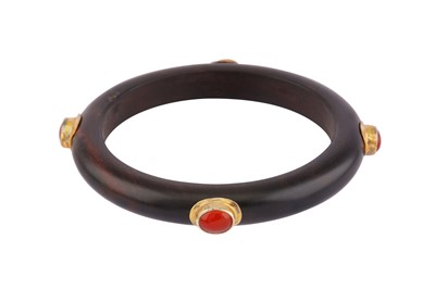 Lot 53 - A WOOD BANGLE