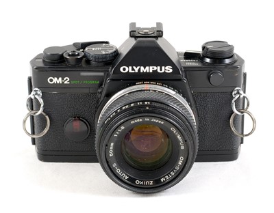 Lot 66 - An Olympus OM2 Spot Program.