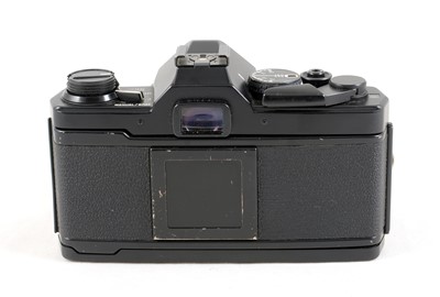 Lot 66 - An Olympus OM2 Spot Program.