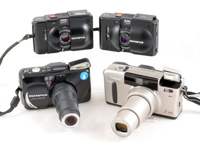 Lot 338 - A Good Group of Four Compact Film Cameras.