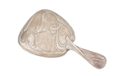Lot 148 - An Edwardian sterling silver hand mirror, London 1905 by William Hutton and Sons