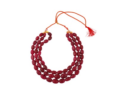 Lot 304 - AN INDIAN MUGHAL-REVIVAL MULTI-STRAND CARVED RUBY BEADS NECKLACE