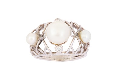 Lot 66 - A THREE NATURAL PEARL RING