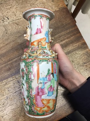 Lot 597 - A PAIR OF CHINESE CANTON FAMILLE-ROSE VASES