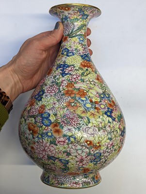 Lot 103 - A CHINESE FAMILLE-ROSE 'MILLEFLEUR' VASE, YUHUCHUNPING