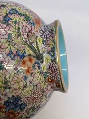 Lot 103 - A CHINESE FAMILLE-ROSE 'MILLEFLEUR' VASE, YUHUCHUNPING