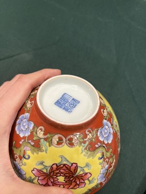 Lot 651 - A CHINESE FAMILLE-ROSE CORAL-GROUND 'PEONY' BOWL