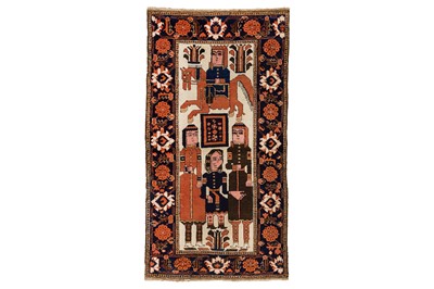 Lot 5 - AN UNUSUAL ANTIQUE PICTORIAL BALOUCH RUG, NORTH-EAST PERSIA