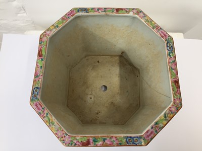 Lot 173 - A CHINESE CANTON FAMILLE-ROSE HEXAGONAL JARDINIÈRE AND STAND