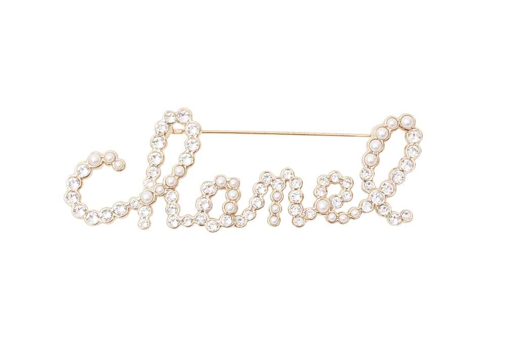 Lot 509 - Chanel Crystal Pearl Script Brooch
