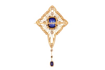 Lot 16 - A SYNTHETIC SAPPHIRE AND DIAMOND PENDANT/BROOCH