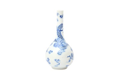 Lot 601 - A CHINESE BLUE AND WHITE 'DRAGON' BOTTLE VASE