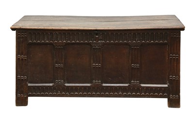 Lot 241 - A 17TH CENTURY PANELED AND CARVED OAK COFFER