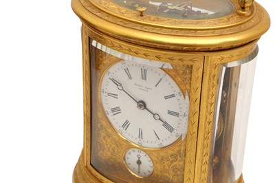 Lot 88 - AN OVAL REPEATER CARRIAGE CLOCK