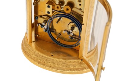 Lot 88 - AN OVAL REPEATER CARRIAGE CLOCK