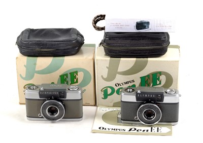 Lot 73 - A Pair of Grey Olympus Pen EE Half Frame Compact Cameras.