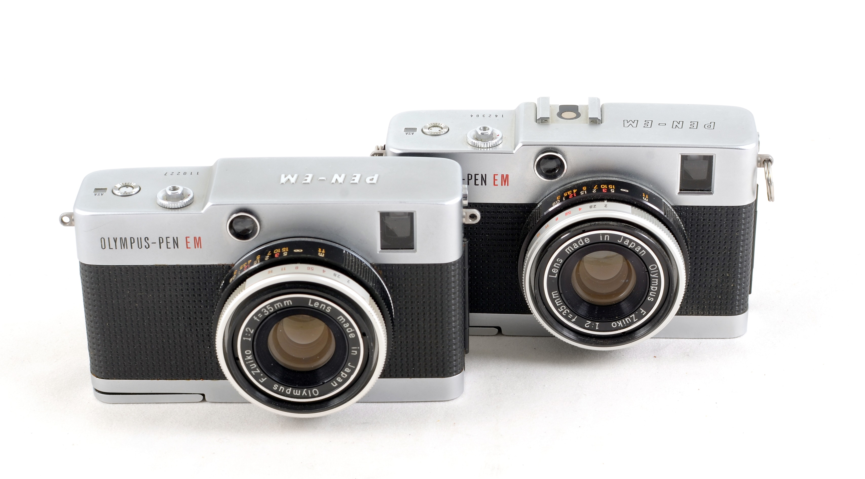 Lot 76 - Olympus Pen EM Half Frame Cameras & Others
