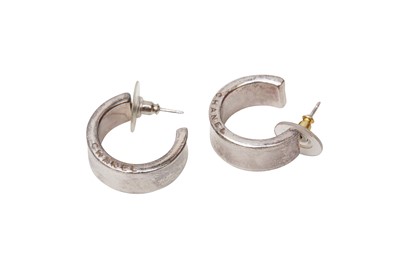 Lot 584 - Chanel Silver Hoop Pierced Earrings