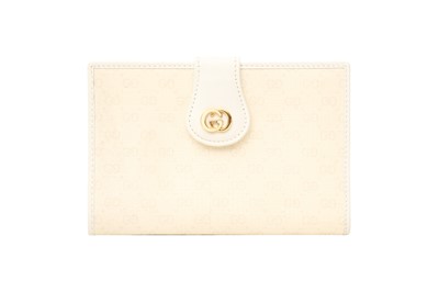 Lot 343 - Gucci Ivory Monogram Bi-Fold Wallet