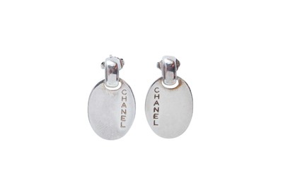 Lot 602 - Chanel Silver Oval Drop Pierced Earrings