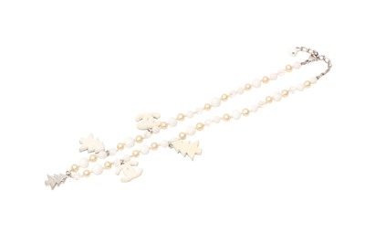 Lot 507 - Chanel White Christmas Charm Necklace