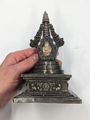 Lot 352 - A MONGOLIAN SILVER 'WHITE TARA' STUPA