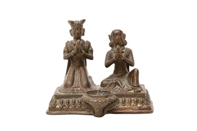 Lot 360 - A NEPALESE BRONZE OIL 'DONORS' LAMP
