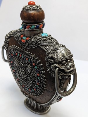 Lot 349 - λ A MONGOLIAN BURLWOOD 'EIGHT BUDDHIST SYMBOLS' FLASK