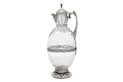 Lot 338 - A Victorian sterling silver mounted cut glass claret jug, London 1893 by Charles Evans