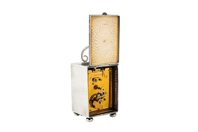 Lot 67 - An Edwardian sterling silver cased travelling time piece or carriage clock, Birmingham 1901 by Douglas Clock Co
