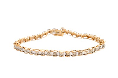 Lot 21 - A DIAMOND LINE BRACELET