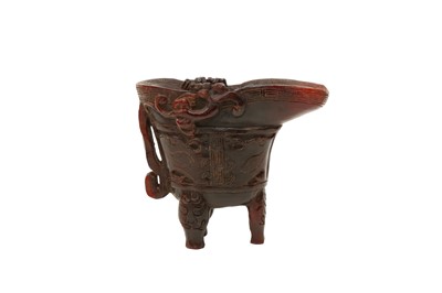 Lot 178 - λ A CHINESE CARVED YAK HORN LIBATION CUP