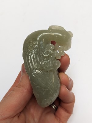 Lot 204 - A CHINESE CELADON JADE 'PHOENIX' WATER POT