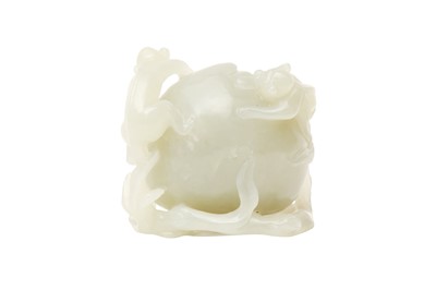 Lot 853 - A CHINESE CELADON JADE 'MONKEYS AND PEACH' CARVING