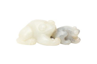 Lot 161 - A CHINESE PALE-CELADON JADE 'FROGS' CARVING