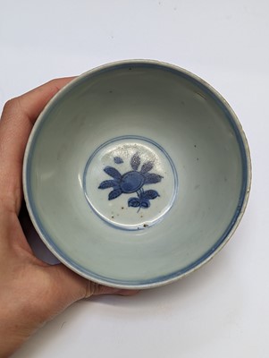 Lot 28 - A PAIR OF CHINESE BLUE AND WHITE 'BIRD AND PEACH' BOWLS