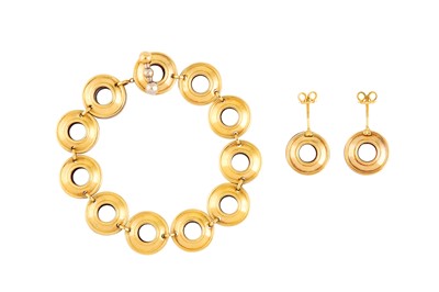 Lot 120 - A MAGIC DISC BRACELET AND EARRING SET BY PALOMA PICASSO FOR TIFFANY