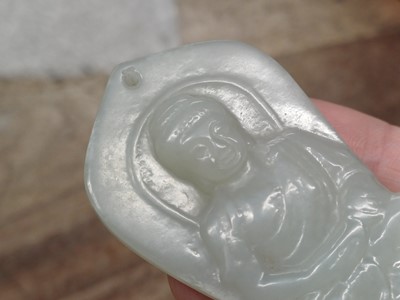 Lot 941 - A CHINESE PALE CELADON JADE 'BUDDHA' PLAQUE