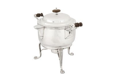 Lot 107 - An early 19th century Indian colonial silver curry and milk pan upon burner stand, Calcutta circa 1830 by Hamilton and Co