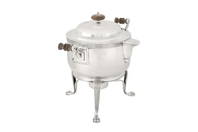 Lot 86 - An early 19th century Indian colonial silver curry and milk pan upon burner stand, Calcutta circa 1830 by Hamilton and Co