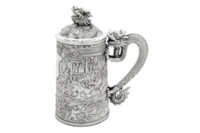 Lot 161 - A large late 19th century Chinese Export silver lidded mug or tankard, Canton circa 1880 by Qiu Ji, retailed by Lee Ching of Canton and later Hong Kong