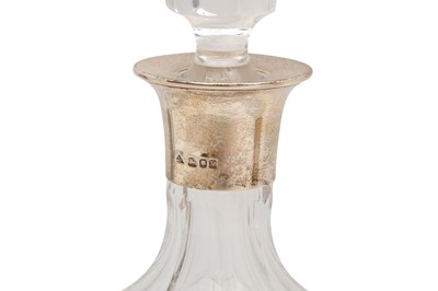 Lot 194 - THREE CONTEMPORARY CRYSTAL DECANTERS WITH HALLMARKED STERLING SILVER COLLARS
