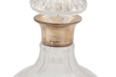 Lot 194 - THREE CONTEMPORARY CRYSTAL DECANTERS WITH HALLMARKED STERLING SILVER COLLARS