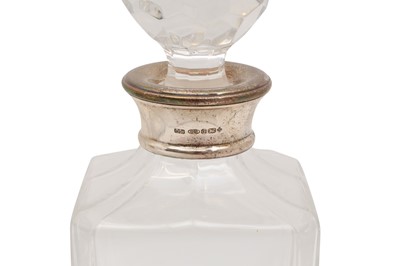 Lot 194 - THREE CONTEMPORARY CRYSTAL DECANTERS WITH HALLMARKED STERLING SILVER COLLARS