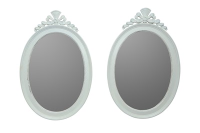 Lot 383 - A PAIR OF 19TH CENTURY-STYLE WHITE PAINTED OVAL MIRRORS