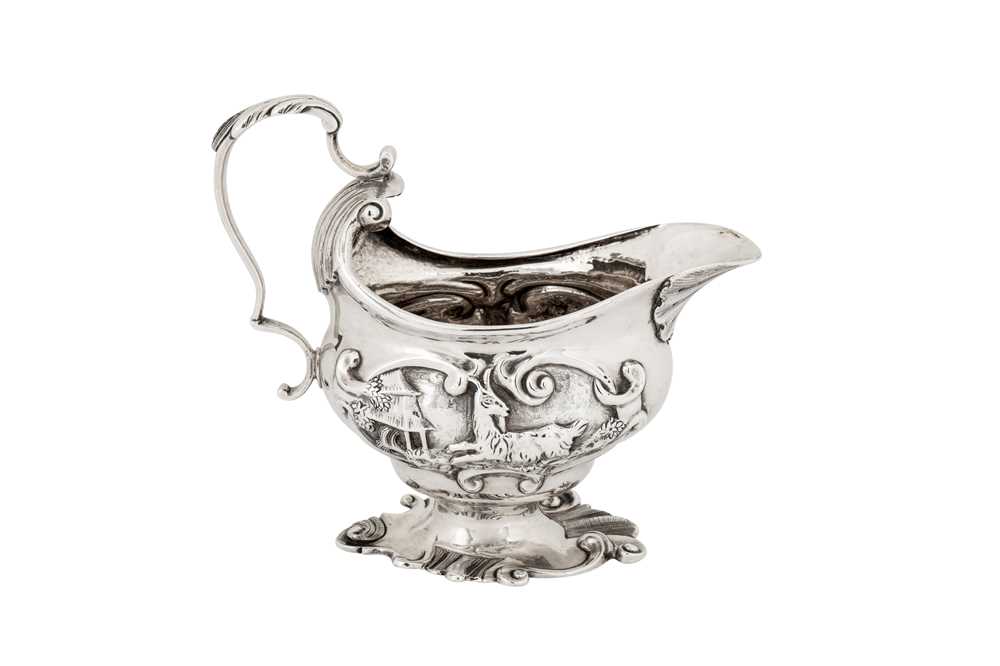 Lot 456 - A George II sterling silver cream jug, London 1749 by Henry Hayens (reg. 13th Oct 1749)