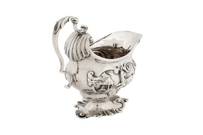 Lot 456 - A George II sterling silver cream jug, London 1749 by Henry Hayens (reg. 13th Oct 1749)