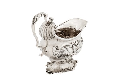 Lot 456 - A George II sterling silver cream jug, London 1749 by Henry Hayens (reg. 13th Oct 1749)