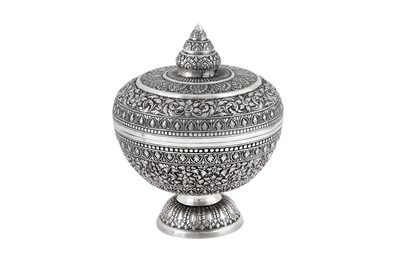 Lot 133 - A mid-20th century Cambodian unmarked silver covered bowl on stand (Tok), circa 1940-60
